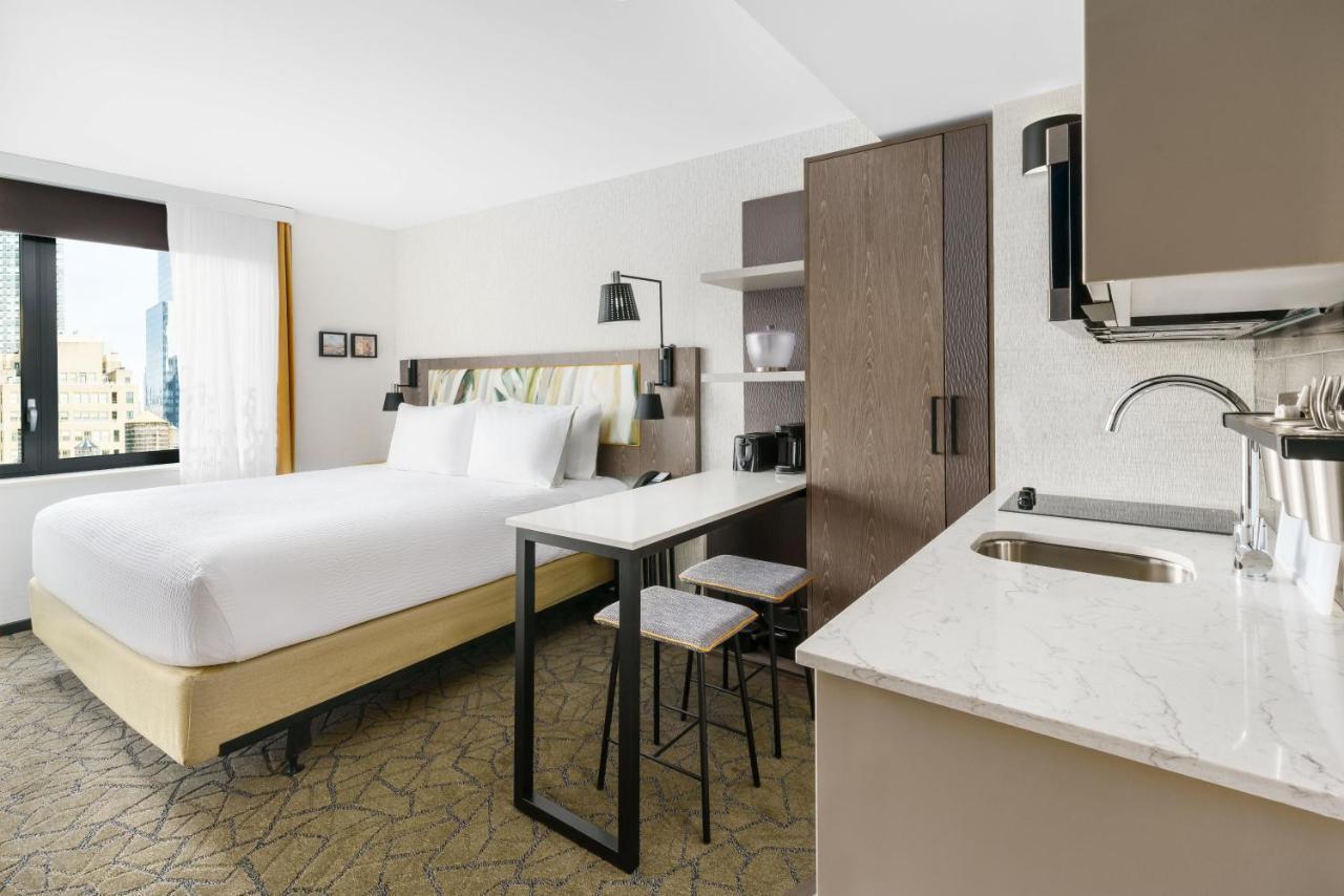 Estúdio com Vista Cidade, Kitchenette Completa e 1 Cama King-size