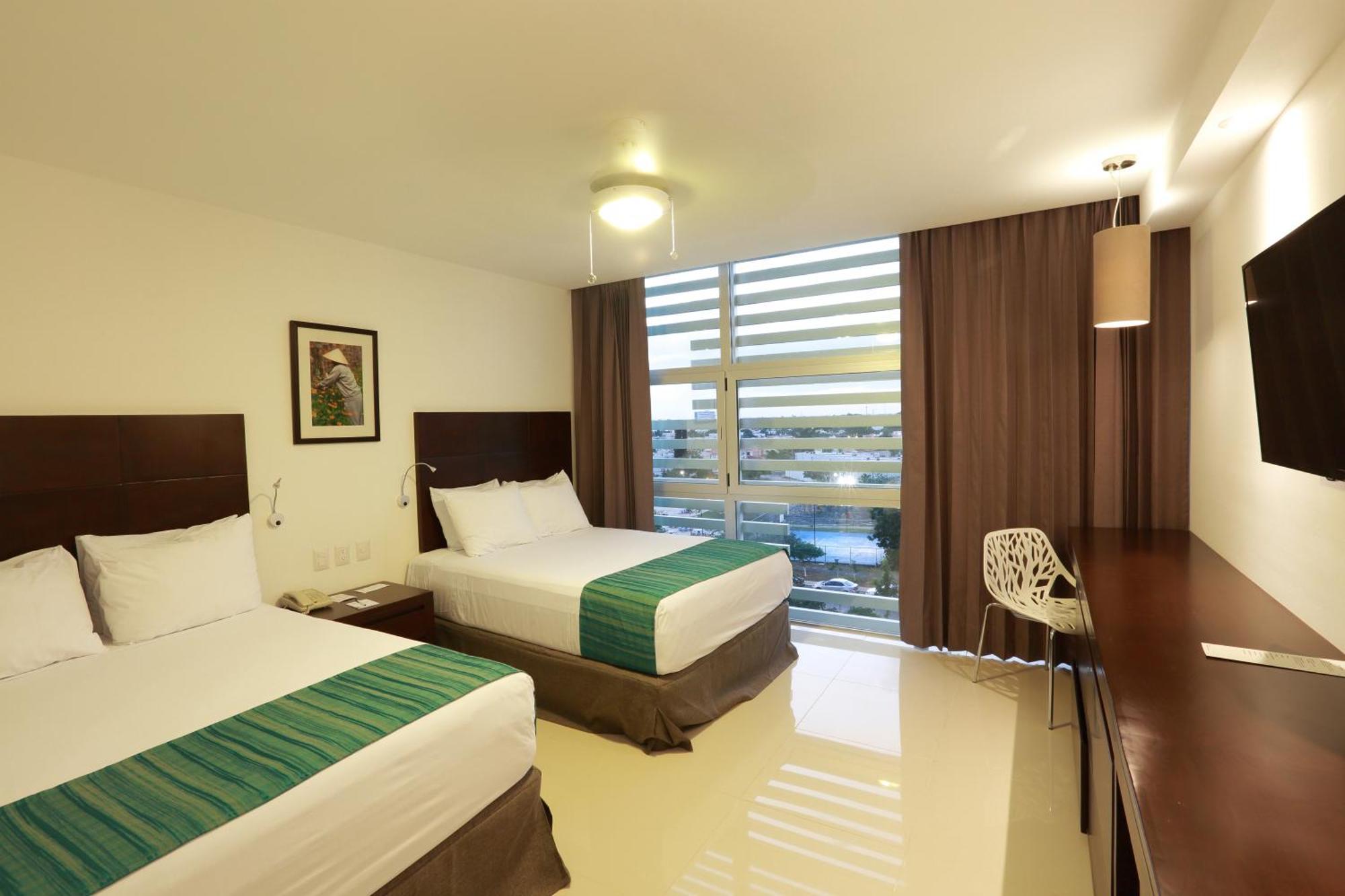 Superior Deluxe Room Mini Refrigerator Garden View 2 double beds