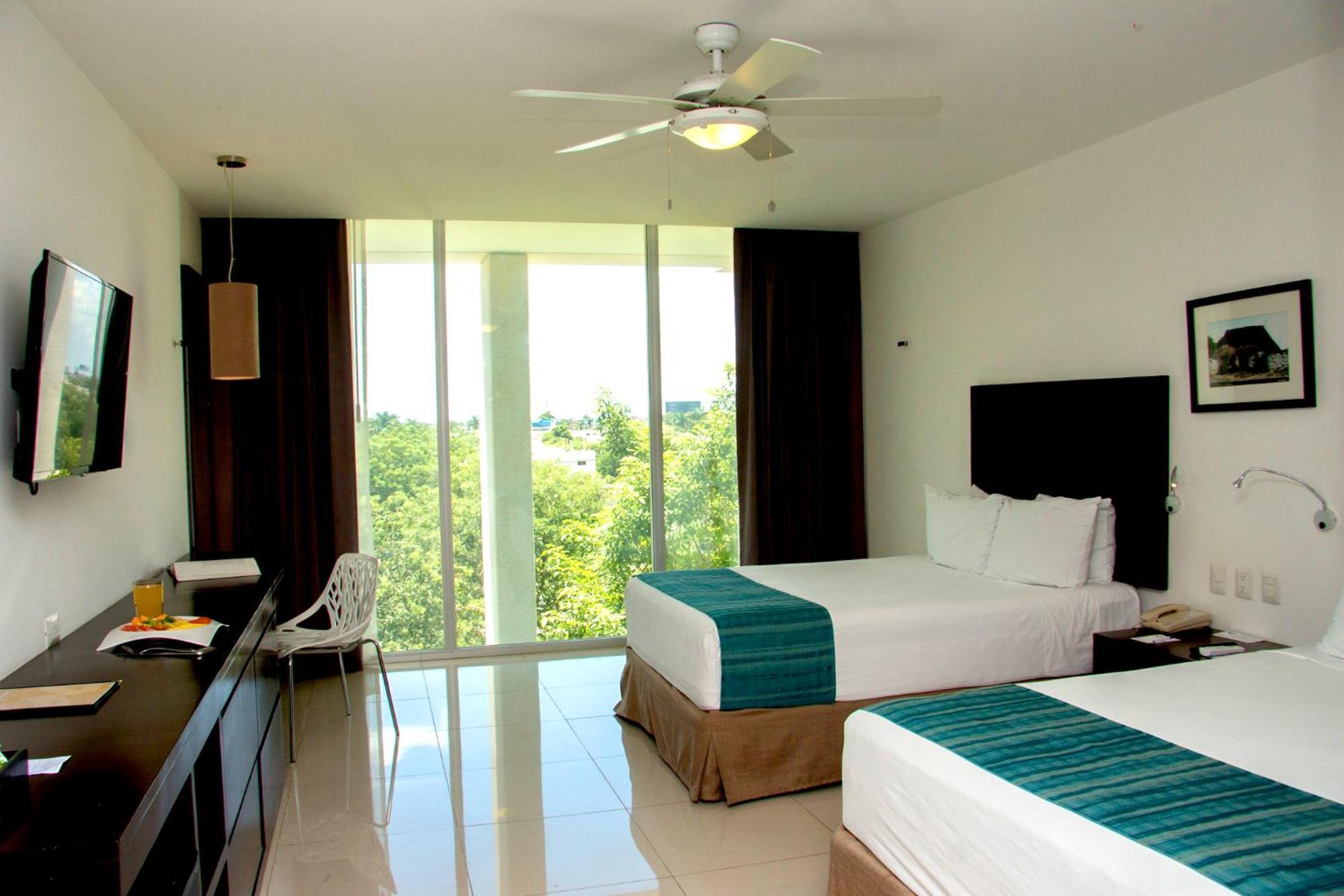 Superior Deluxe Room Mini Refrigerator Garden View 2 double beds