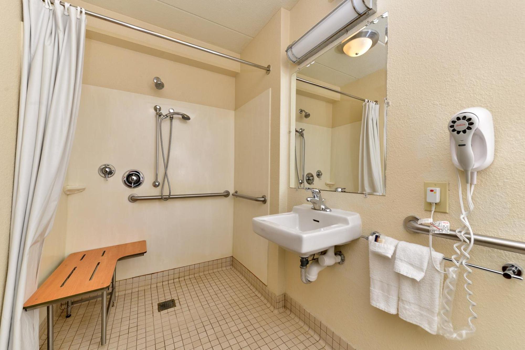 Premium King Room Disability Access Roll Shower Smoke Upgraded Bedding & Snack