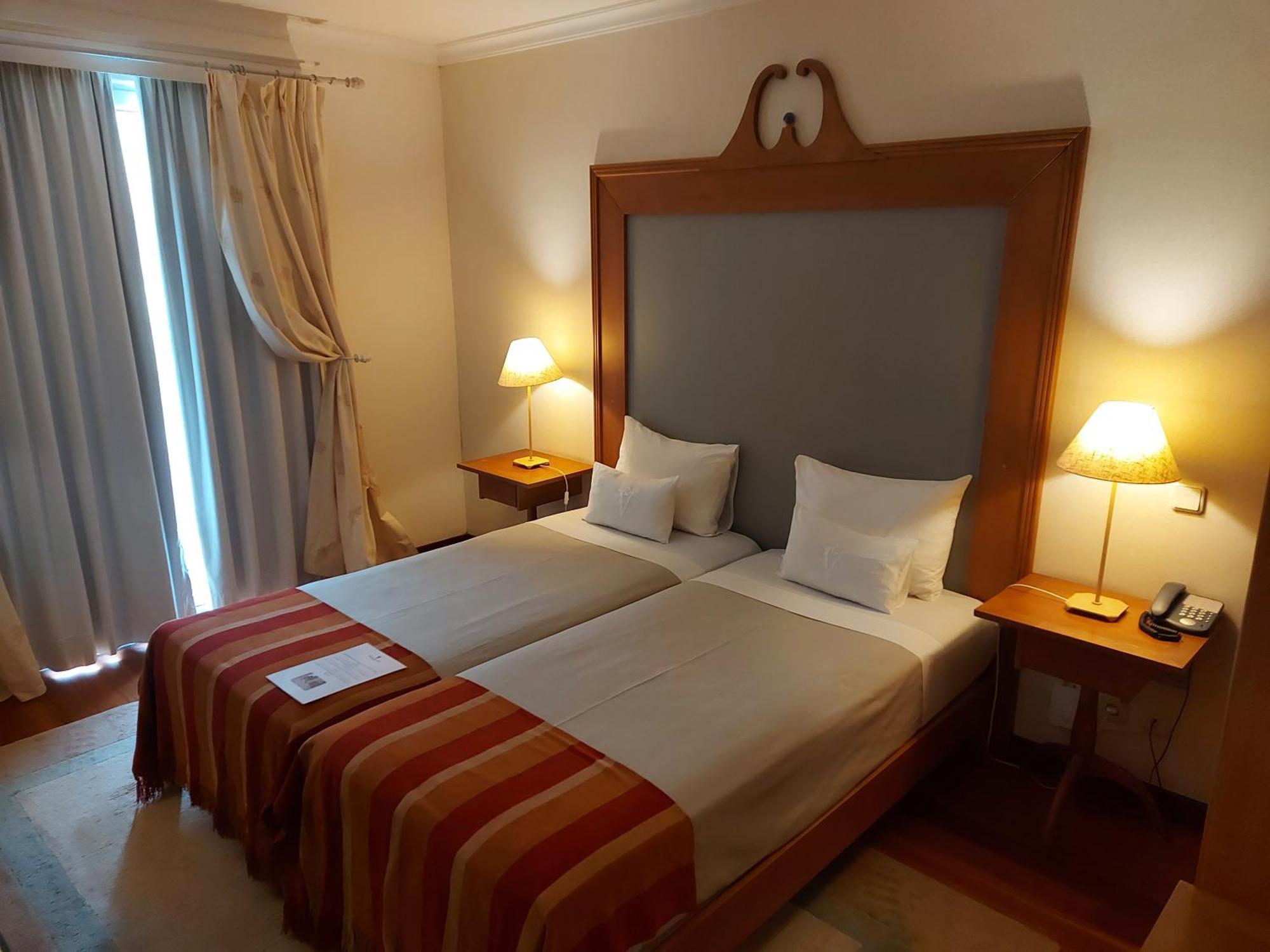 Quarto Twin com Vista Terra (2 Adultos + 1 Criança)
