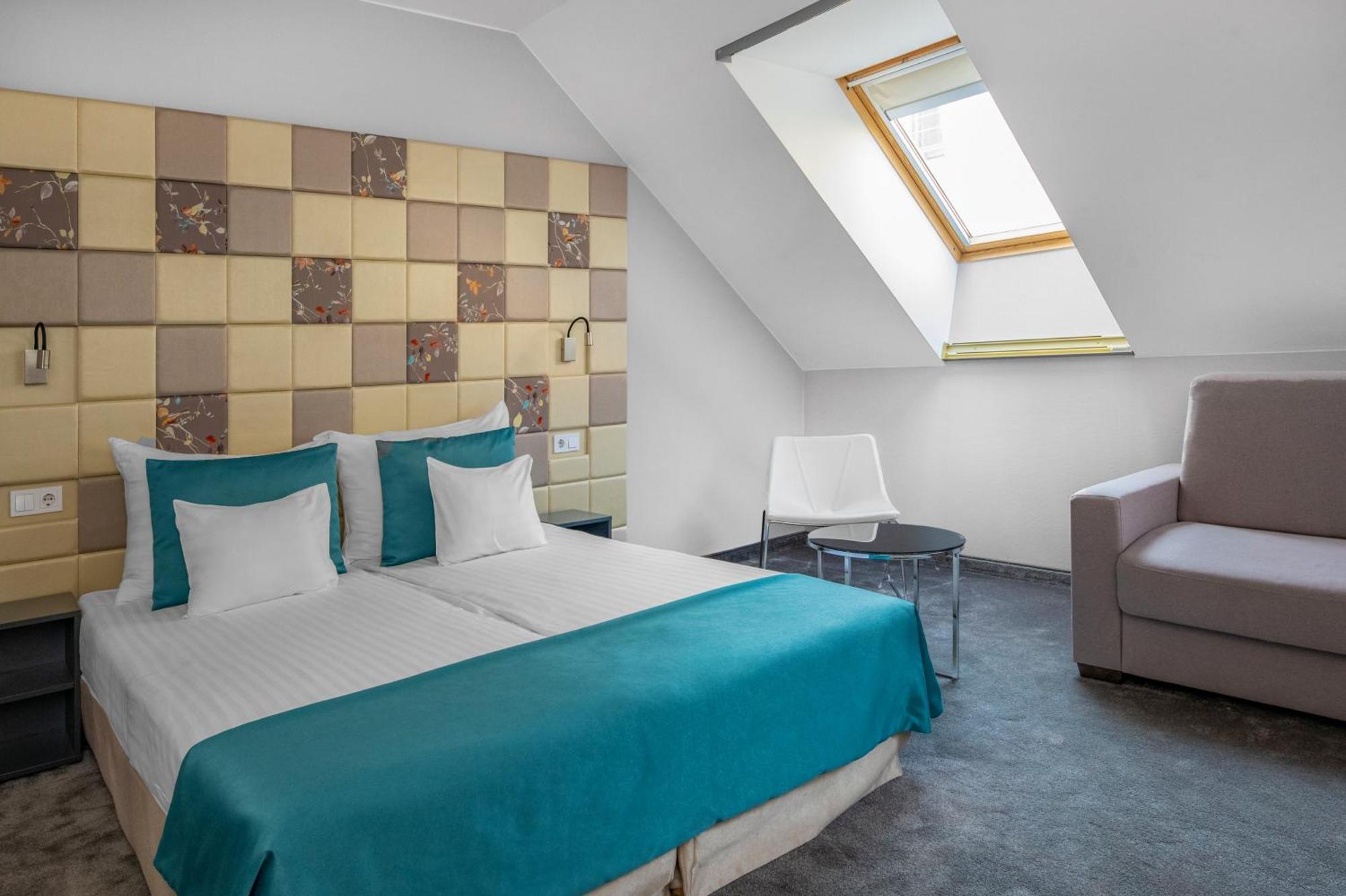 Superior Manzard Room with Sofa,1580160850:JPEG