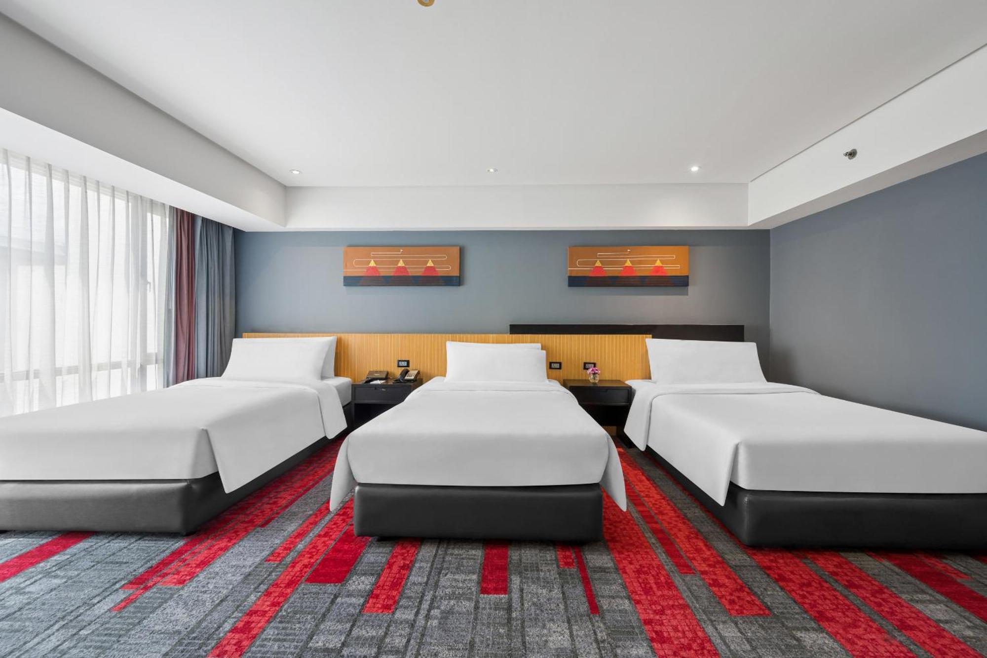 Habitación Triple Deluxe Grand