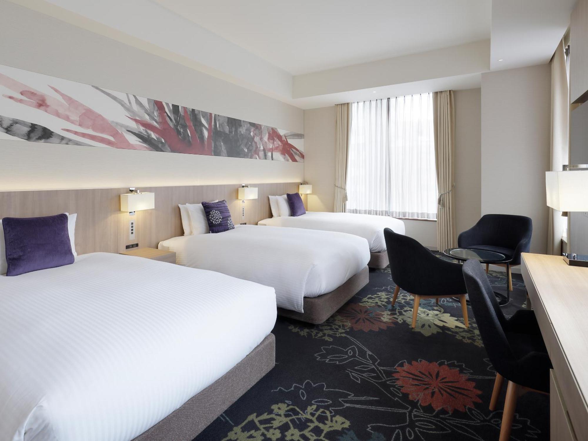 Deluxe Corner Triple Room
