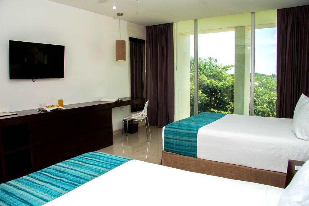 Superior Deluxe Room Mini Refrigerator Garden View 2 double beds
