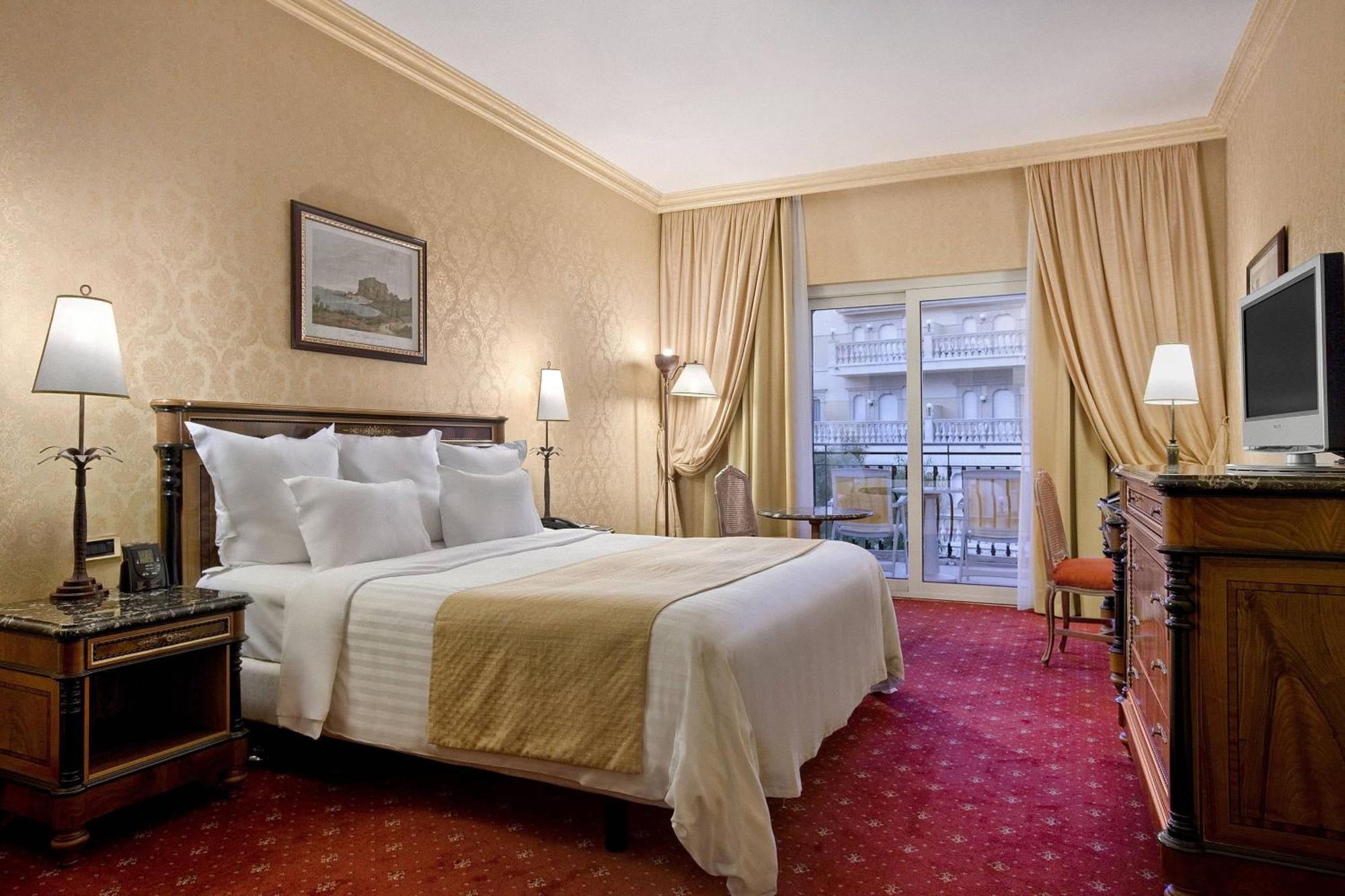 King Room with Balcony and Limited View,693898860:JPEG