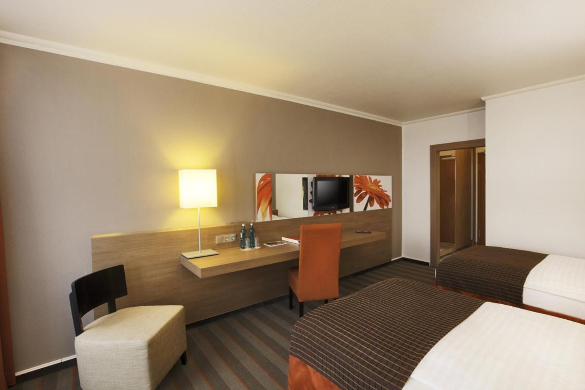 Quarto com 2 Camas de Solteiro e Varanda