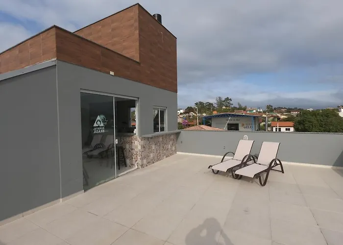 Casinha: Rosa Surf Hostel & Food